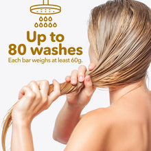 Load image into Gallery viewer, Person holding wet hair with text about shampoo bar durability and weight.