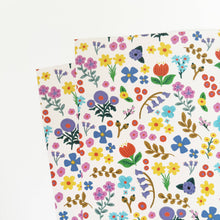 Load image into Gallery viewer, Pattern of colorful flowers on a white background