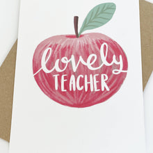 Load image into Gallery viewer, Card with a red apple and 'lovely teacher' text on a white background