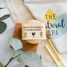 Load image into Gallery viewer, Lemon Eucalyptus Conditioner Bar on a wooden board with 'The Natural Spa' branding.