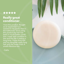Load image into Gallery viewer, Bar of soap with a five-star rating and customer review on a green background