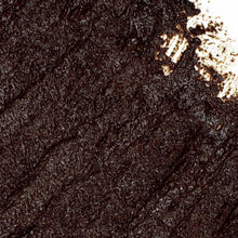 Load image into Gallery viewer, Close-up of a textured brown surface with a light spot