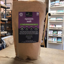 Load image into Gallery viewer, Bag of Ecoliving Epsom salt on a wooden surface with shelves in the background