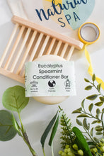Load image into Gallery viewer, Eucalyptus Spearmint Conditioner Bar with wooden holder and green leaves on a white background