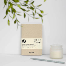 Load image into Gallery viewer, Sustainable notebook with a candle and pen on a white surface