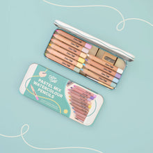 Load image into Gallery viewer, Set of pastel watercolor pencils in a tin on a light blue background