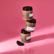 Load image into Gallery viewer, Three jars of face scrub stacked on a pink background with 'Top Circle' branding.
