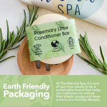 Load image into Gallery viewer, Rosemary Lime conditioner bar with packaging on a wooden tray, surrounded by rosemary leaves, with text about Earth Friendly Packaging.

