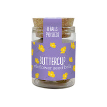 Load image into Gallery viewer, Jar of buttercup wildflower seed balls with a purple label on a white background
