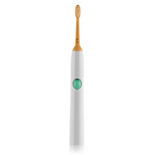 Load image into Gallery viewer, White toothbrush with a green button on a white background
