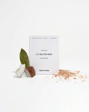Load image into Gallery viewer, Scented balm packaging with natural elements on a white background
