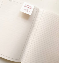 Load image into Gallery viewer, Notebook with a Vent for Change label on a white background
