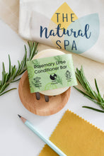 Load image into Gallery viewer, Rosemary Lime conditioner bar on a wooden dish with greenery and 'The Natural Spa' branding.
