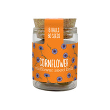 Load image into Gallery viewer, Glass jar with cornflower seed balls and an orange label on a white background
