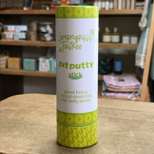 Load image into Gallery viewer, Green and white cylindrical container labeled 'pit putty stick' on a wooden surface.
