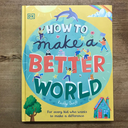 Book titled 'How to Make a Better World' on a wooden surface