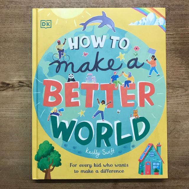 Book titled 'How to Make a Better World' on a wooden surface