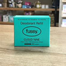 Load image into Gallery viewer, Teal box of 'fussy.' Cloud Nine deodorant refill on a wooden surface with a blurred store background.
