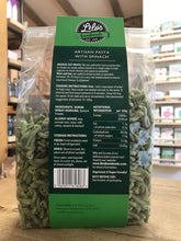 Load image into Gallery viewer, Packaged artisian pasta with spinach on a wooden surface
