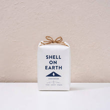 Load image into Gallery viewer, White package with 'Shell on Earth' text and logo on a beige background
