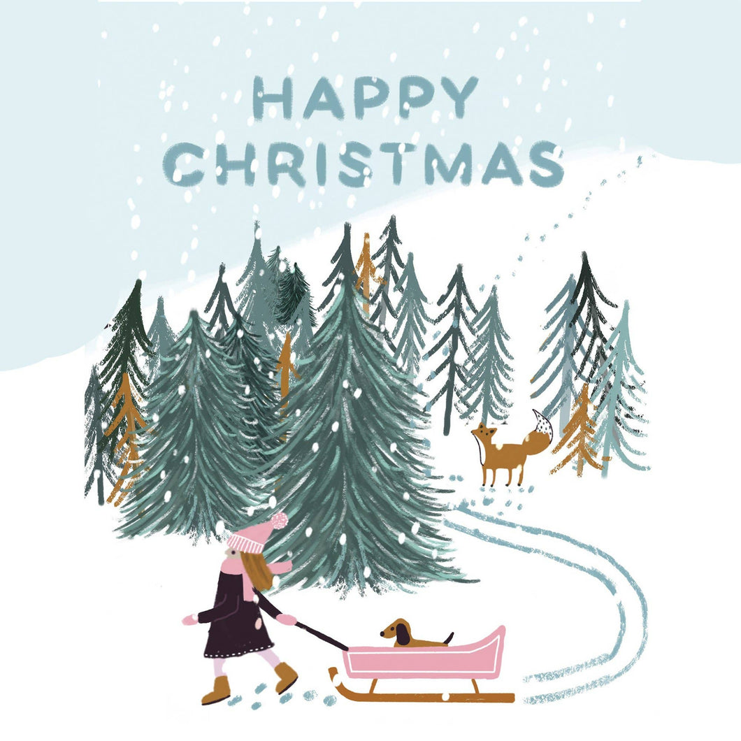 Christmas card with a girl, dog, and deer in a snowy forest