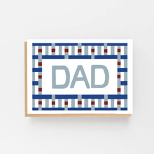 Load image into Gallery viewer, Card with 'DAD' text and blue and red pattern on a white background
