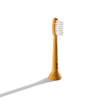 Load image into Gallery viewer, Bamboo toothbrush with white bristles on a white background

